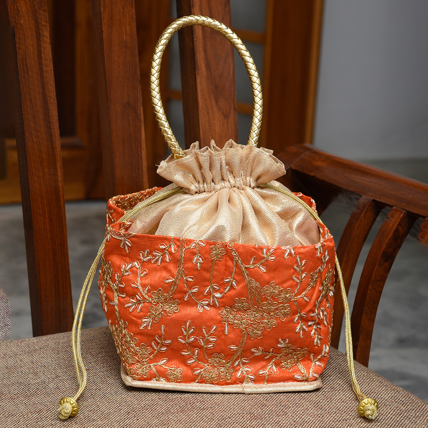 Kuber Industries Hand Bag|Silk Embroidery Drawstring Bag|Traditional Indian Handmade 5 Pocket Potli Bag with Golden Handle (Orange)