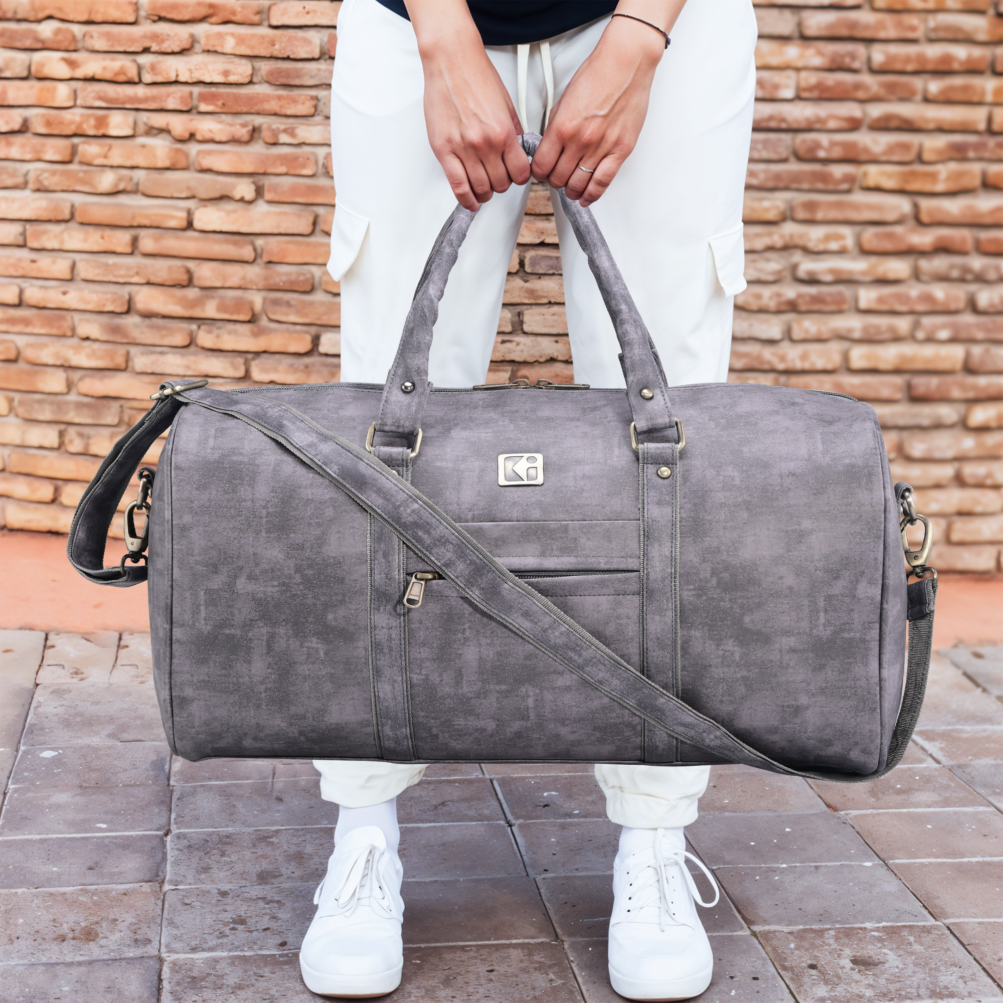 Kuber Industries Premium Leather Duffle Bags for Travel for Women  Men  Cabin Bag with Detachable Shoulder Strap  Foam Handle  Water Resistant Luggage Bag for Travelling  Sandstone Grey