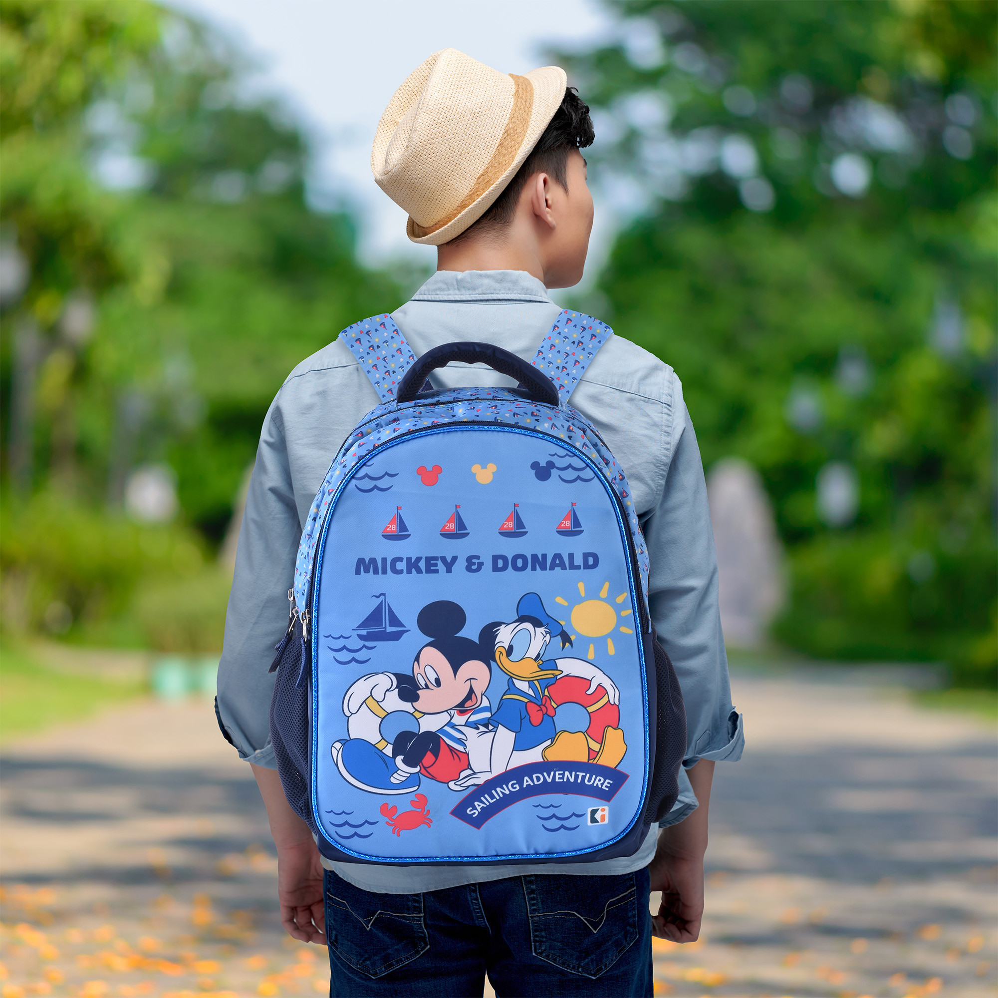 Kuber Industries School-College Bag  Disney Mickey Donald Backpack for Boys and Girls  4 Compartment Travel Backpack  Water Resistant Bookbag  Bag for Daily Routine  Laptop Bag  Large  Blue